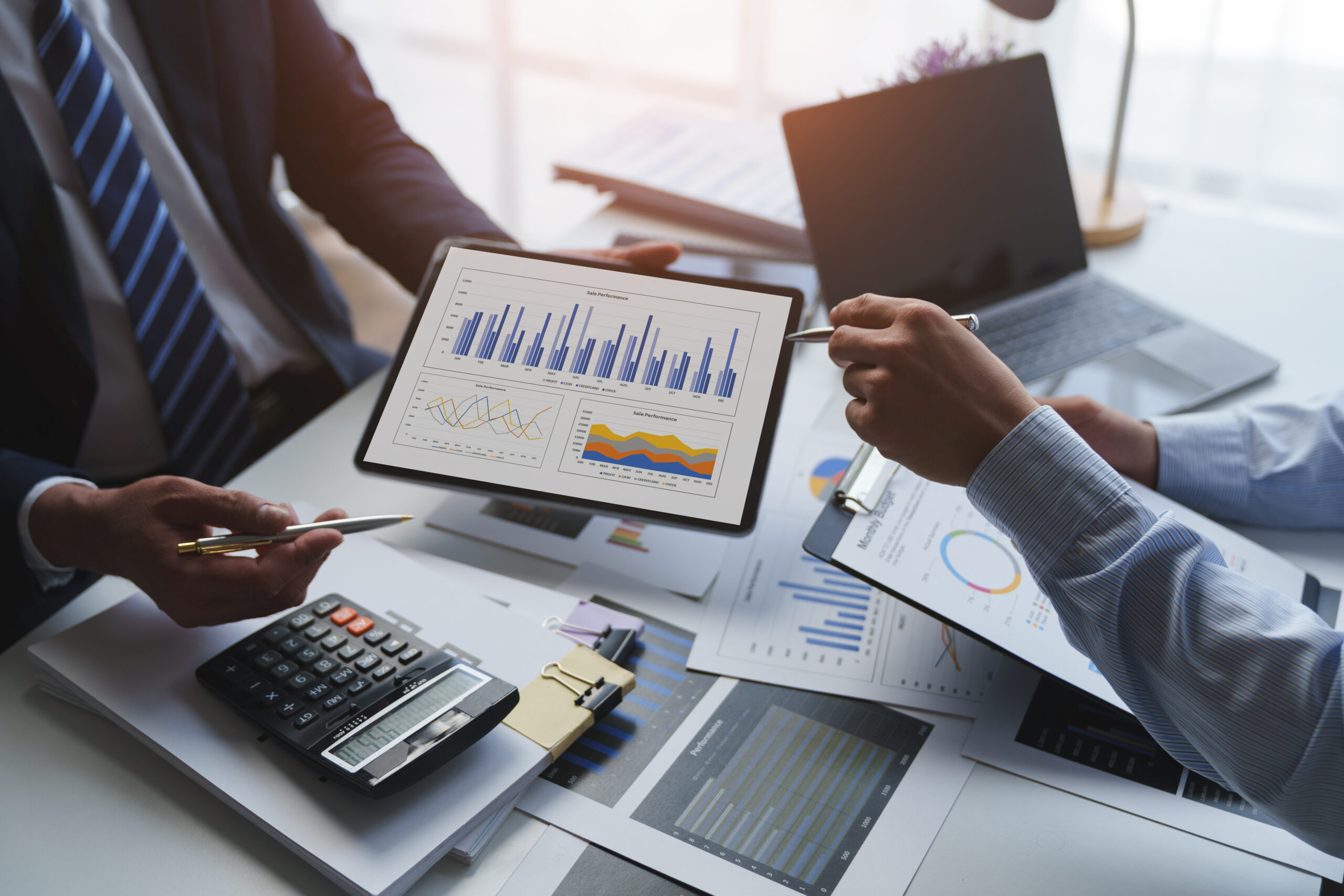 Asian male financial officer or accountant checking investment results Financial budget analysis Planning to summarize results and report to the meeting Audit concept and investment results.